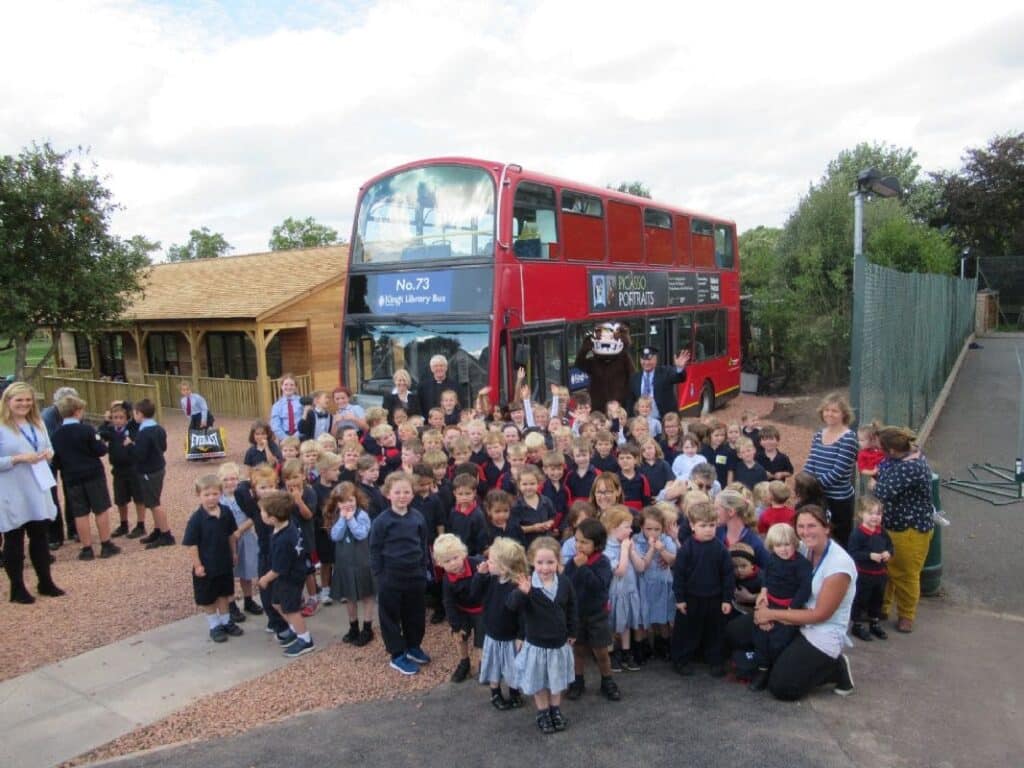 Kids Surrounding Kings Hawford Library Bus