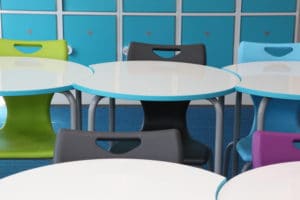 White tables in a classroom
